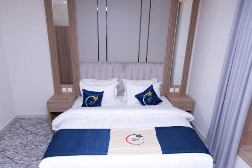 Katil atau katil-katil dalam bilik di فندق نجمة مارينا Marina Star Hotel