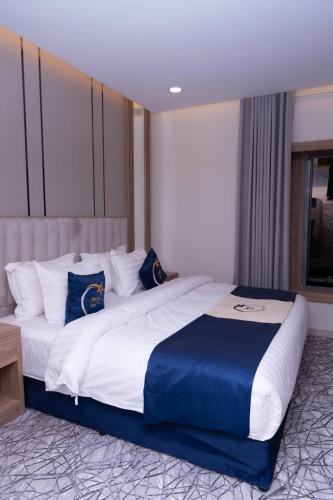 Katil atau katil-katil dalam bilik di فندق نجمة مارينا Marina Star Hotel