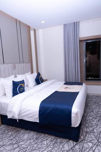 Katil atau katil-katil dalam bilik di فندق نجمة مارينا Marina Star Hotel