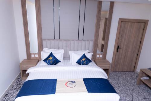 Katil atau katil-katil dalam bilik di فندق نجمة مارينا Marina Star Hotel