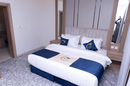 Katil atau katil-katil dalam bilik di فندق نجمة مارينا Marina Star Hotel