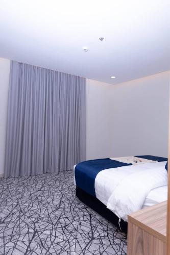 Katil atau katil-katil dalam bilik di فندق نجمة مارينا Marina Star Hotel