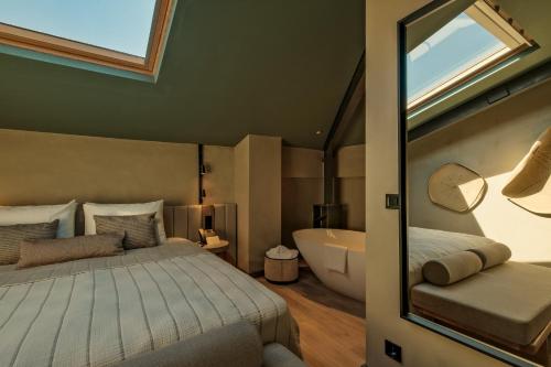 Lecole Hotel By Cityloftにあるベッド