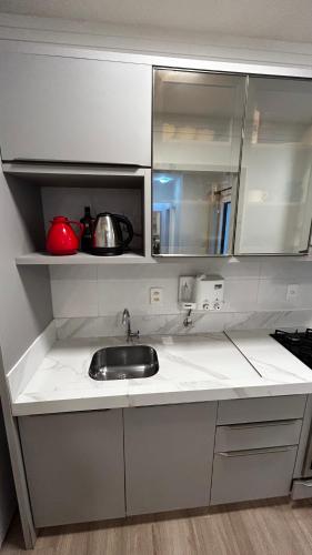 Kuchyň nebo kuchyňský kout v ubytování Apartamento à 100 metros do mar - Meia Praia