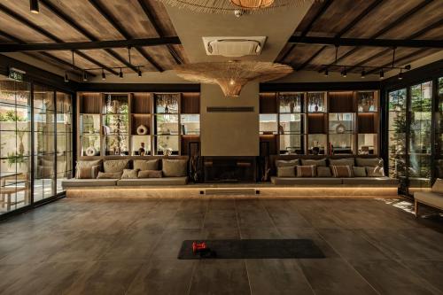 Lecole Hotel By Cityloftにあるフィットネスセンターまたはフィットネス設備