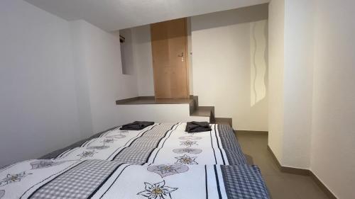 Postel nebo postele na pokoji v ubytování Ferienwohnung Slavica Dorfstrasse 94 Randa