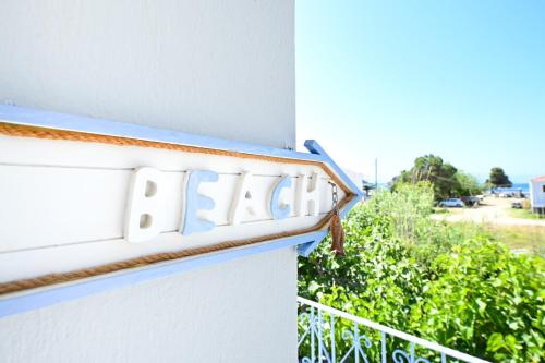 a balcony with a blue and white railing with a view at Anchor Villa in Troulos