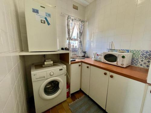 Køkken eller tekøkken på Beachfront Studio Flat