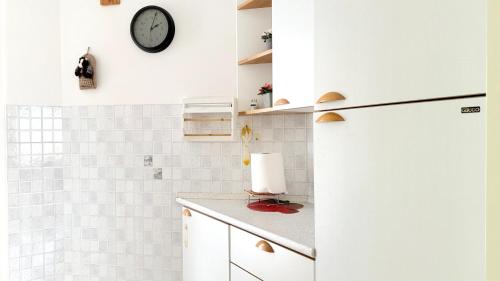 Kuchyň nebo kuchyňský kout v ubytování M446 - Marcelli, trilocale in residence con piscina
