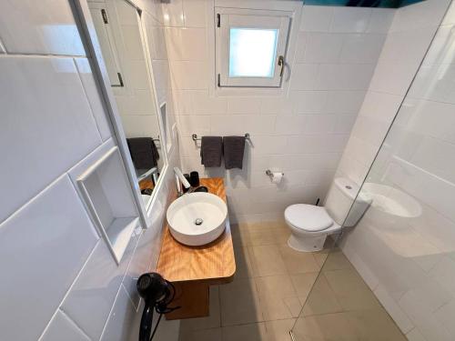 Vannituba majutusasutuses Apartamentos Avenida