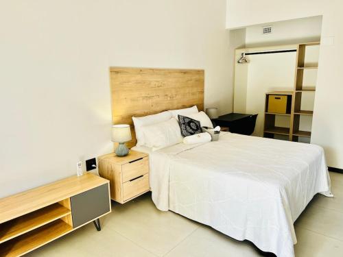 Кровать или кровати в номере La Casa Villa
