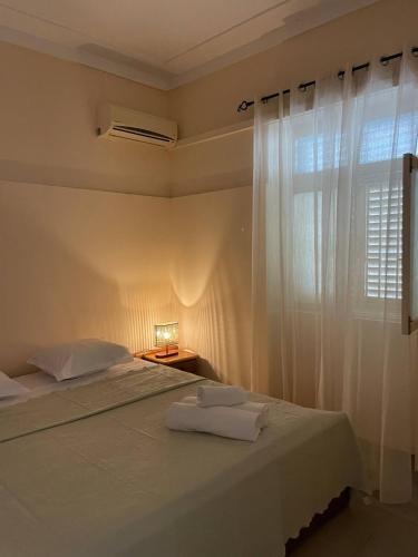 Voodi või voodid majutusasutuse Apartamentos Avenida toas