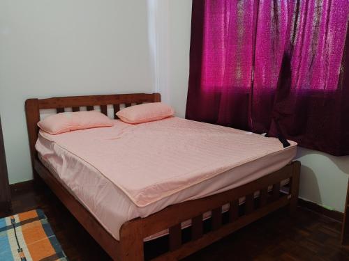 Postel nebo postele na pokoji v ubytování Ayan Homestay