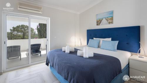 Ένα ή περισσότερα κρεβάτια σε δωμάτιο στο Apartamento Fairway