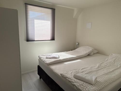 Ένα ή περισσότερα κρεβάτια σε δωμάτιο στο Central apartment, 10 min near Pulpitrock