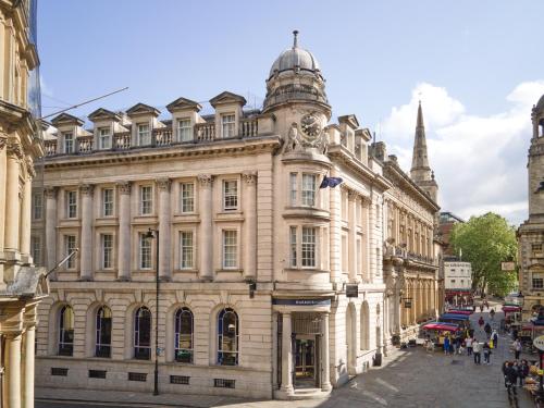 a large building on a street in a city at Harbour Hotel & Spa Bristol in Bristol