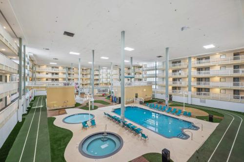 an indoor pool in a large apartment building at Ocean Breeze - Island Retreat for 6 in Hilton Head Island