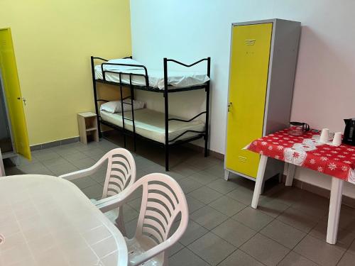 Postel nebo postele na pokoji v ubytování Camping Village Il Poggetto