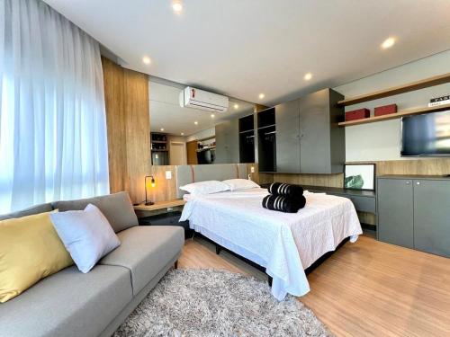 Katil atau katil-katil dalam bilik di Loft 413 Inn no Parque Una
