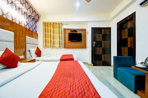 Cama o camas de una habitación en Hotel Emerald Park At Airport