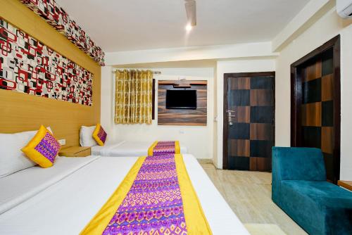 Cama o camas de una habitación en Hotel Emerald Park At Airport