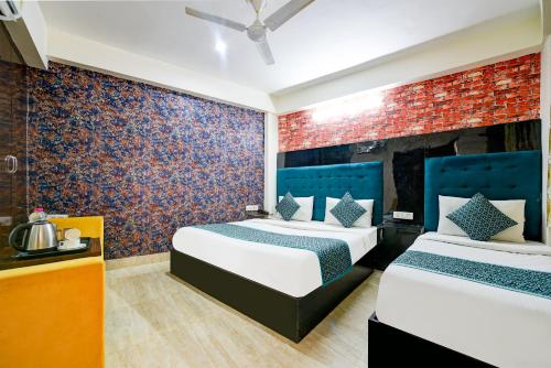 Cama o camas de una habitación en Hotel Emerald Park At Airport