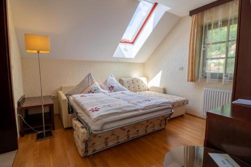 Ένα ή περισσότερα κρεβάτια σε δωμάτιο στο Vila Silva Marija Apartments
