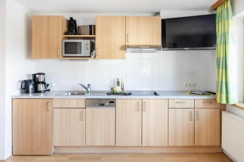 Kuchyň nebo kuchyňský kout v ubytování Haus Annette