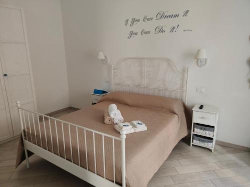 a small bedroom with a bed with a crib at Romantico Rifugio in Guardiagrele