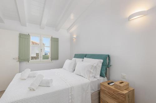 Ένα ή περισσότερα κρεβάτια σε δωμάτιο στο Cristina's Casa