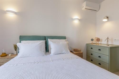 Ένα ή περισσότερα κρεβάτια σε δωμάτιο στο Cristina's Casa