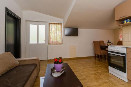 Η κουζίνα ή μικρή κουζίνα στο Paradise Bay Apartments