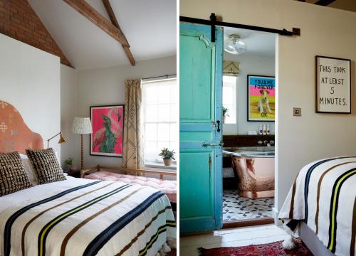 a bedroom with a bed and a bathroom with a tub at Artist Residence Cornwall in Penzance