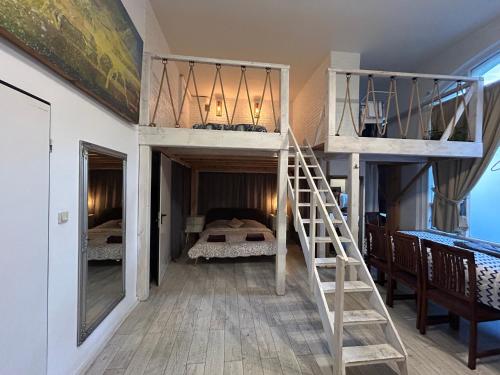 Ένα ή περισσότερα κρεβάτια σε δωμάτιο στο Loft Apartments and Event Venue in Central Warsaw