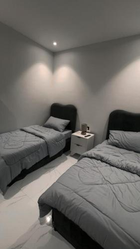 Ένα ή περισσότερα κρεβάτια σε δωμάτιο στο سويت خاص هادئ بدخول ذاتي