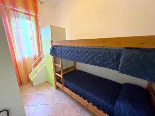 Ένα ή περισσότερα κρεβάτια σε δωμάτιο στο Apartment in Bibione 54648