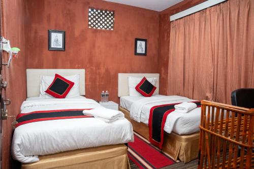 Cama o camas de una habitación en Hotel Lahana