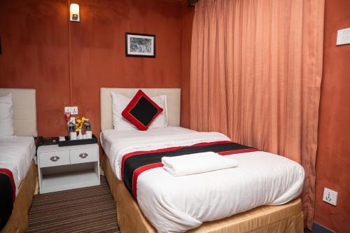 Cama o camas de una habitación en Hotel Lahana