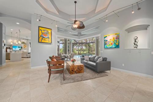 a living room with a couch and a table at Sanctuary Chateau in Sanibel