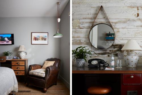 a bedroom with a mirror and a chair and a desk at Artist Residence London in London