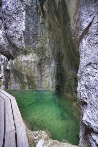 a pool of water in a rock cave at Alojamiento La Fresneda in La Fresneda