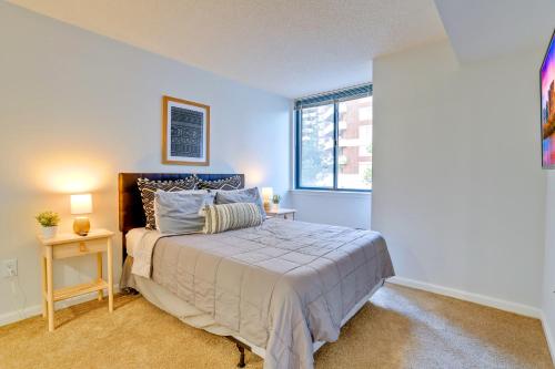 a bedroom with a bed and a window at Top Location in Ballston - Pool & Gym Access in Arlington