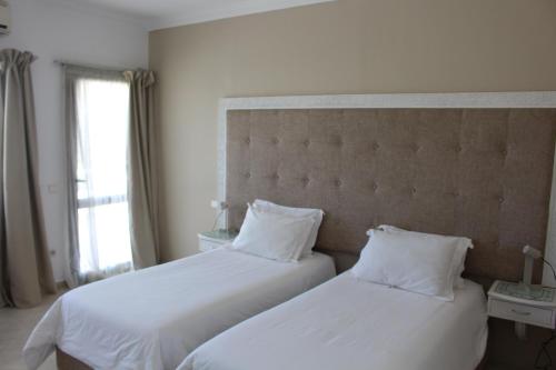 Una cama o camas en una habitación de Casa Palma
