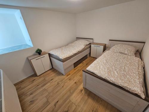 Ένα ή περισσότερα κρεβάτια σε δωμάτιο στο Apartament by B