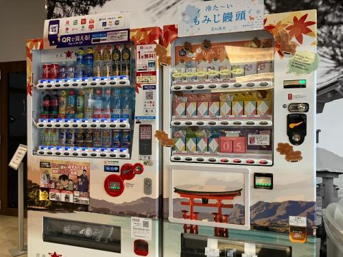 a refrigerator filled with lots of different types of drinks at Smile Hotel Hiroshima in Hiroshima