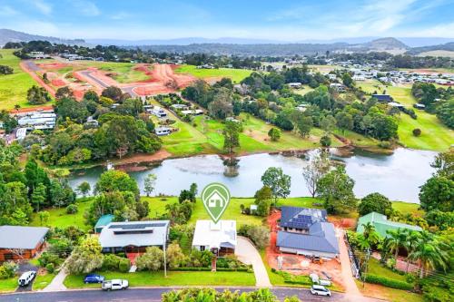 an aerial view of a town with a river at Oleander Escape Lake Front Retreat in Yungaburra