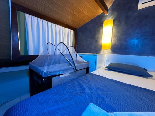 Posteľ alebo postele v izbe v ubytovaní Bangalô Pé na Areia e Piscina Gigante no Beach Class Muro Alto