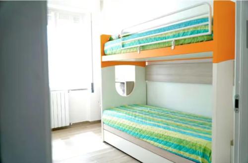 Postel nebo postele na pokoji v ubytování Casa Topazio - 500mt dalla spiaggia