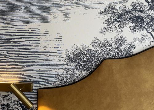a drawing of a river with a tree on a wall at Hotel Steeds aan Zee in Katwijk