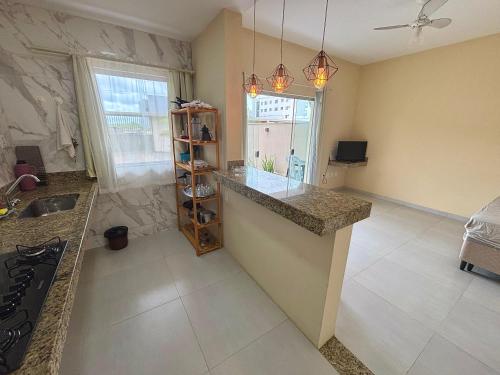 Μια τηλεόραση ή/και κέντρο ψυχαγωγίας στο Casa Tartaruga 2 - Conforto a 50m da Praia de Guriri